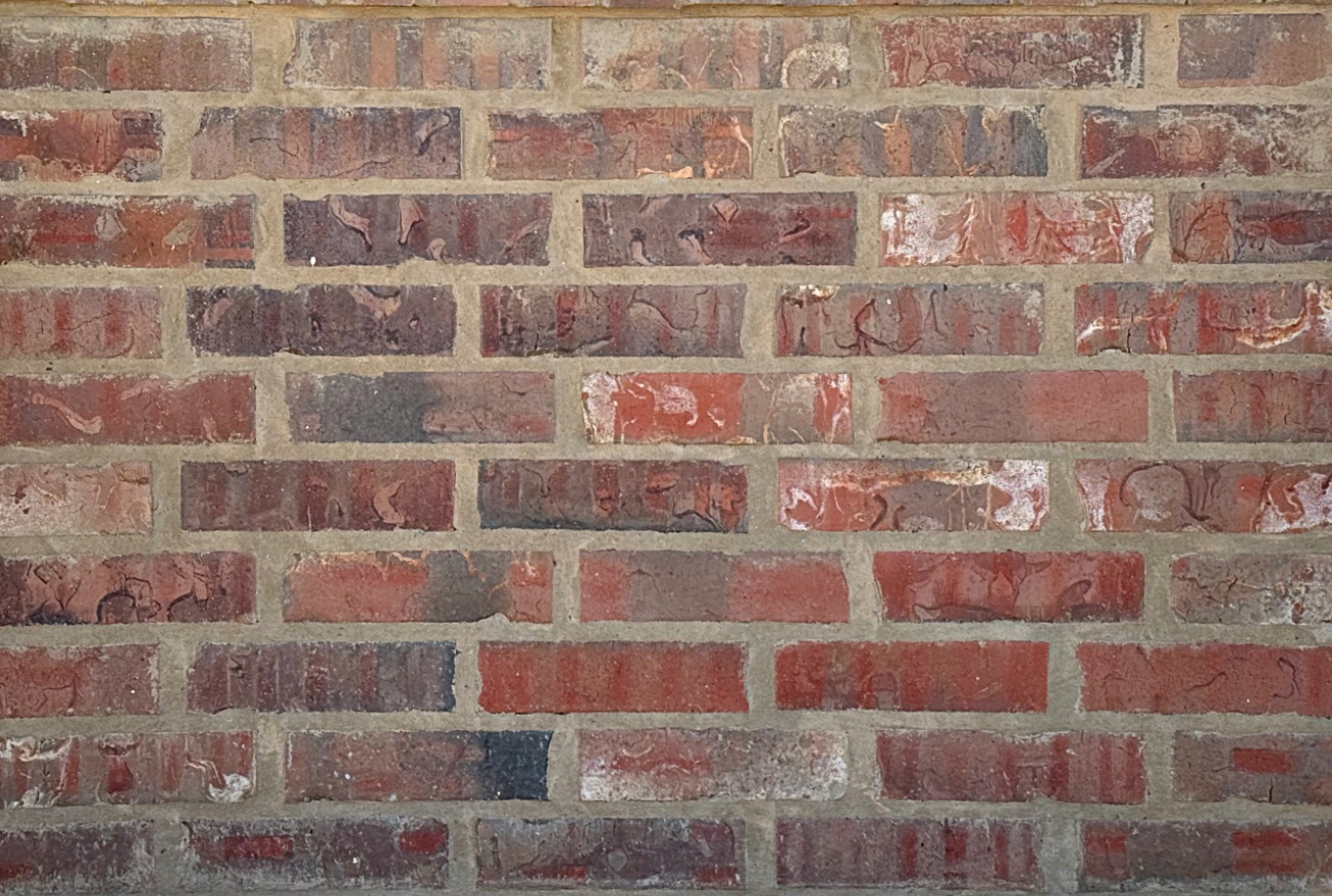 Magnolia Buff mortar in the joints of a brick wall